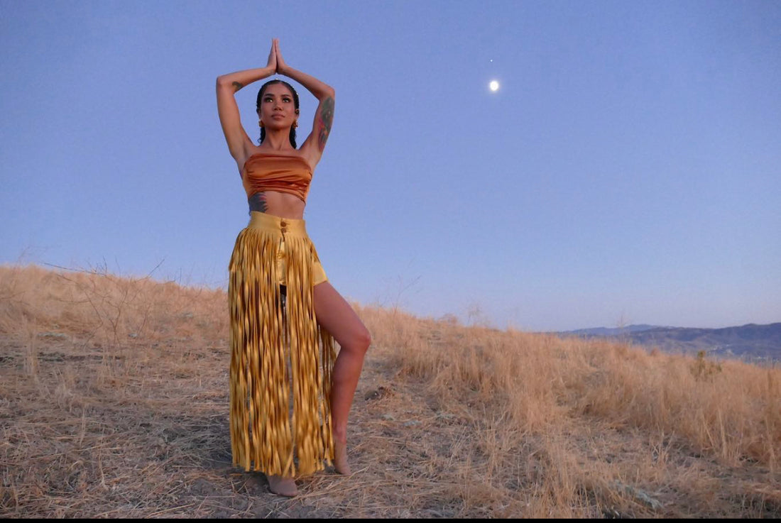 Singer Jhene Aiko in our Logo Earrings.