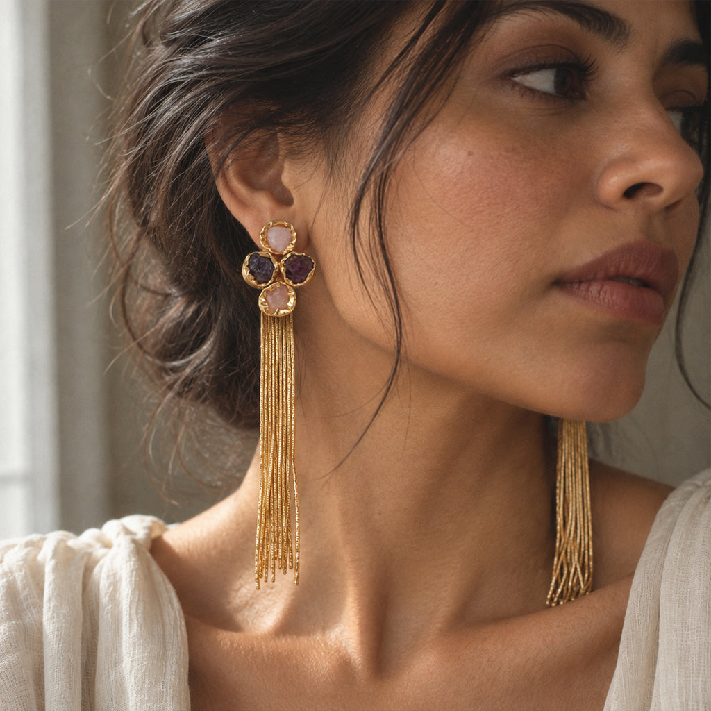 Model wearing Fiora amethyst and blush natural stone tassel earrings
