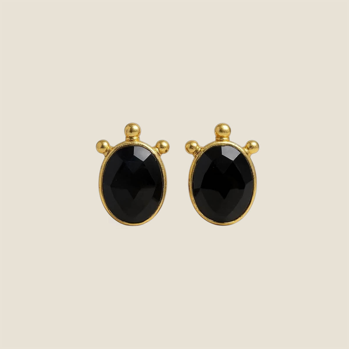 Virella Earrings – black onyx stud earrings in gold plated brass  
Virella Earrings – classic bold gemstone earrings for everyday wear  