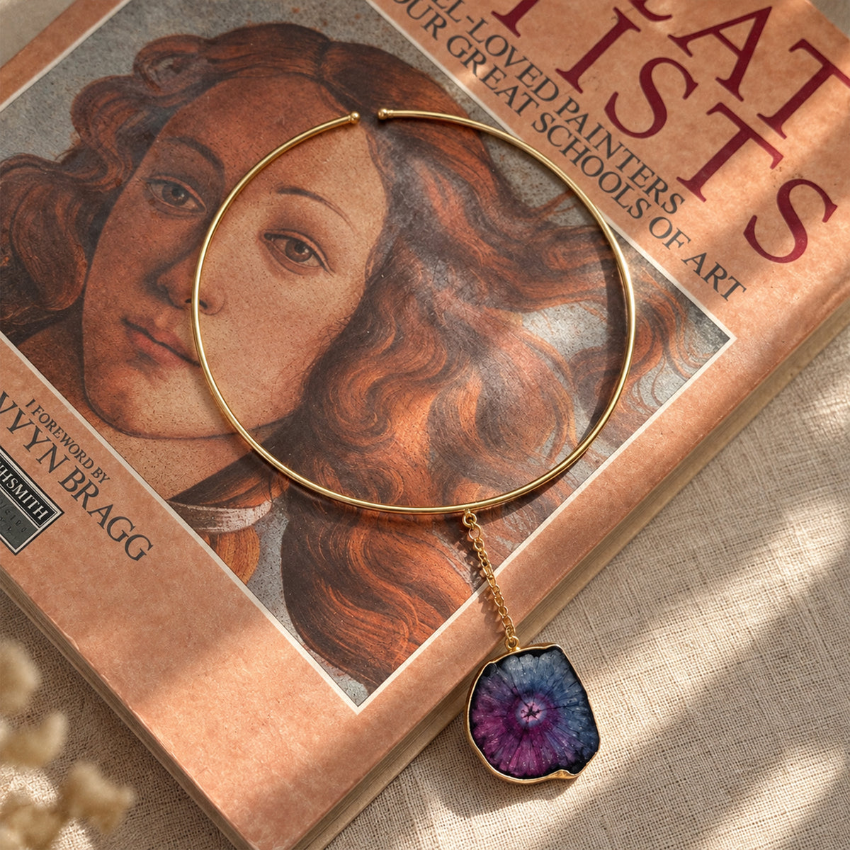 Prism Agate Collar Necklace styled with a book in an editorial composition